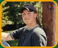 Dustin Worthington smiling in his cap